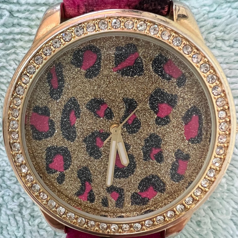 Lady watch ,pink color with stones for sale.